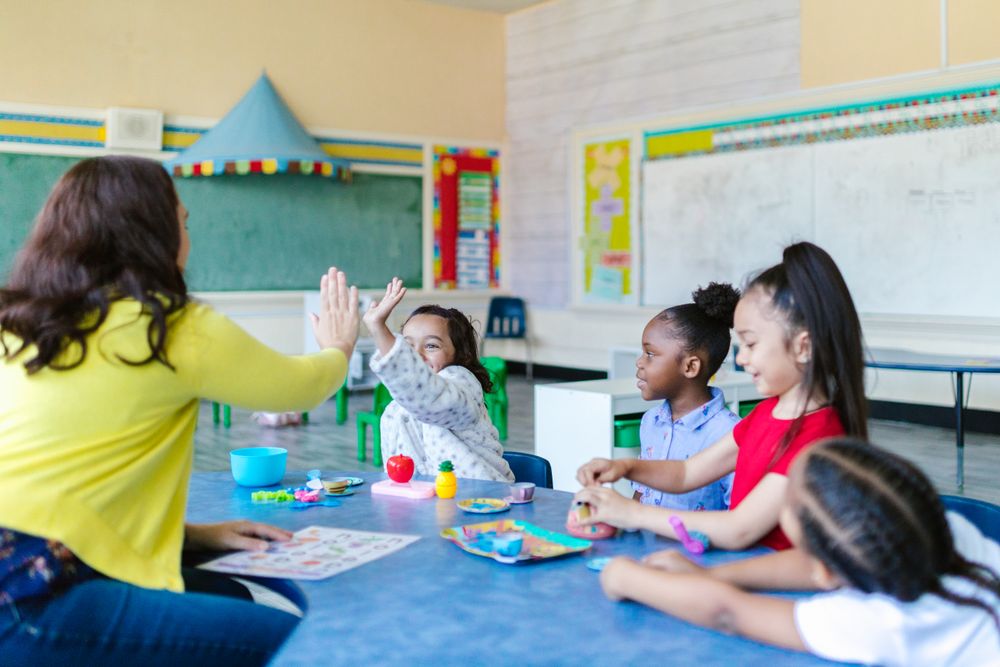 A teacher with young children